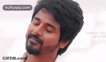 Bearded Man Smiling With Eyes Closed GIF
