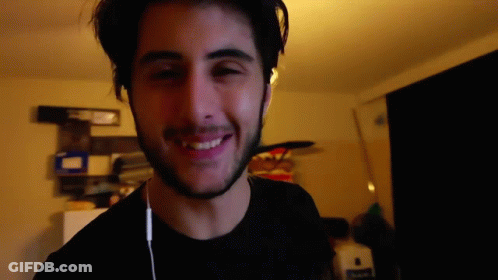 Bearded Man Smiling With Headphones GIF