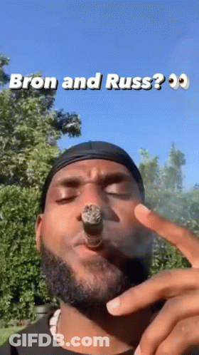 Bearded Man Smoking Cigar With Bron And Russ GIF
