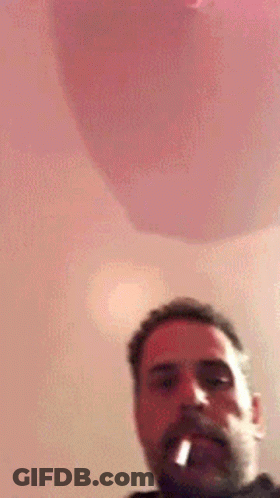 Bearded Man Smoking Cigarette Pink Balloon GIF