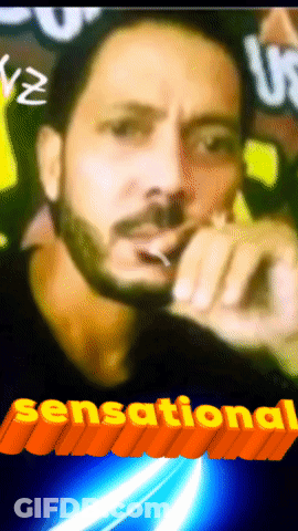Bearded Man Smoking Cigarette Saying Sensational In Orange GIF