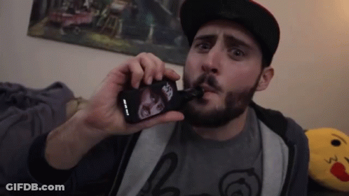 Bearded Man Smoking Cigarette With Joker Sticker GIF