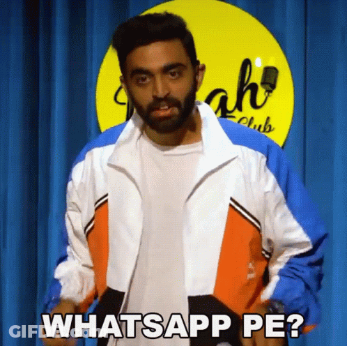 Bearded Man Standing At Club Sign GIF