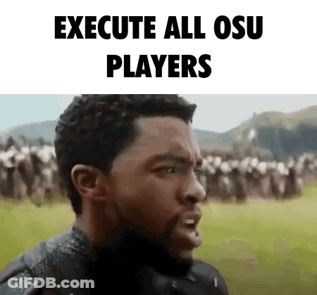 Bearded Man Standing Before Crowd GIF