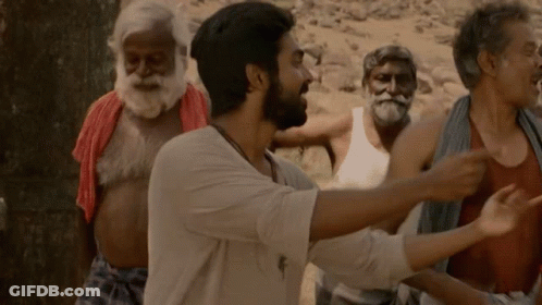 Bearded Man Standing Before Group GIF