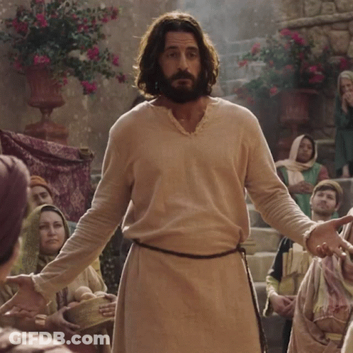 Bearded Man Standing In Front Of Crowd GIF