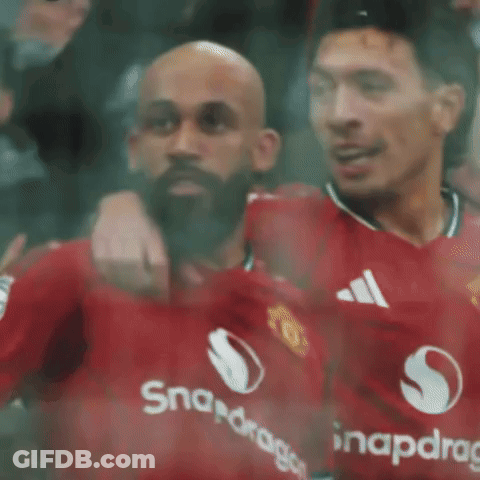 Bearded Man Standing In Front Of Crowd GIF