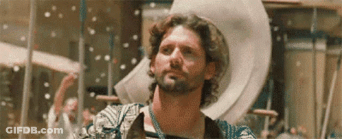 Bearded Man Standing In Front Of Group GIF