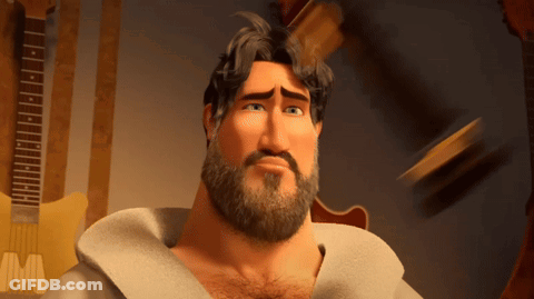 Bearded Man Standing In Front Of Guitar With M GIF
