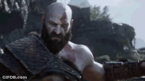 Bearded Man Standing In Front Of Mountain GIF