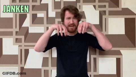 Bearded Man Standing In Front Of Wall Saying Janken GIF