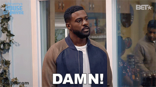 Bearded Man Standing In Front Of Window Saying Damn GIF