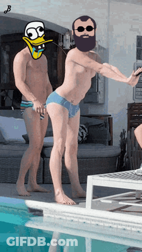 Bearded Man Standing Next To Man With Duck Face GIF