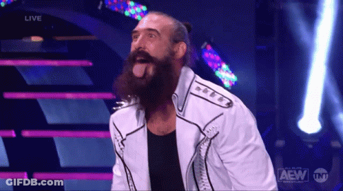 Bearded Man Standing On Stage With AEW Logo GIF