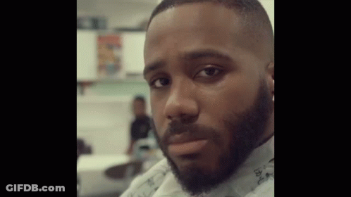 Bearded Man Staring At Camera GIF
