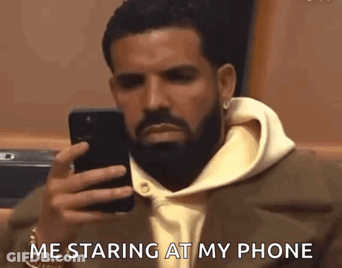 Bearded Man Staring At Phone Says Me Staring At My Phone GIF