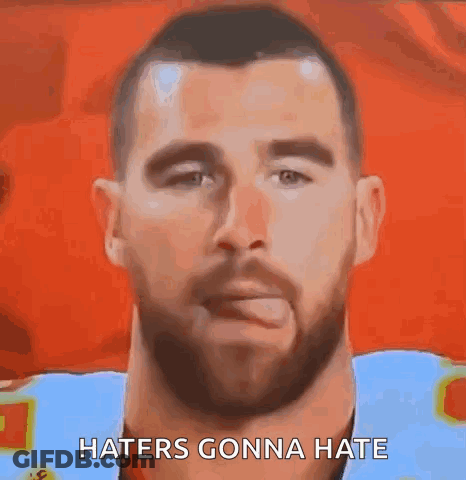 Bearded Man Sticking Out Tongue Haters Gonna Hate GIF