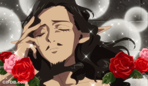 Bearded Man Surrounded By Roses GIF