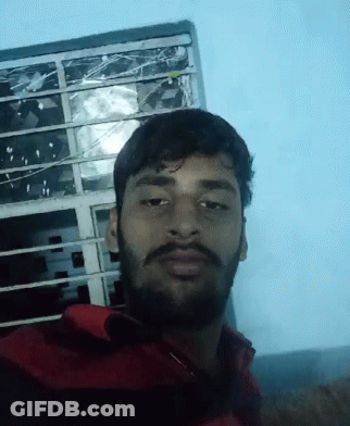 Bearded Man Taking Selfie Broken Window Building GIF