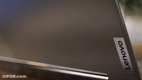 Bearded Man Taking Selfie In Front Of Yellow And Green Flag GIF