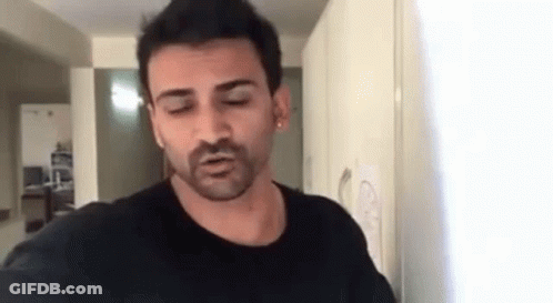 Bearded Man Taking Selfie With Eyes Closed GIF