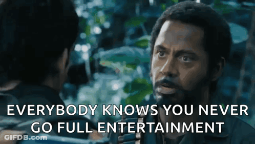 Bearded Man Talking To Another Man In Movie GIF