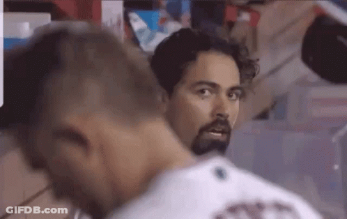 Bearded Man Talking To Another Man In Room GIF