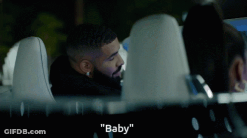 Bearded Man Talking To Woman In Car Saying Baby GIF