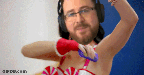 Bearded Man Wearing Candy Cane Dress And Headphones GIF