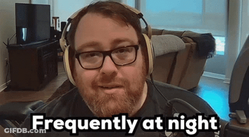 Bearded Man Wearing Headphones And 'He' Shirt GIF