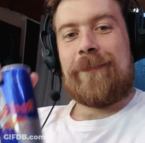 Bearded Man Wearing Headphones Holding Red Bull GIF