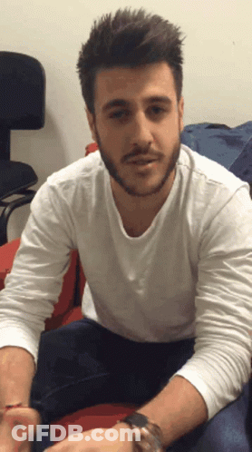 Bearded Man Wearing Watch And White Shirt GIF