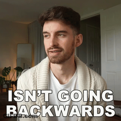 Bearded Man White Sweater Isn't Going Backwards GIF