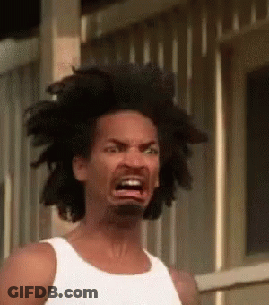 Bearded Man With Afro Making Funny Face In White Tank Top GIF