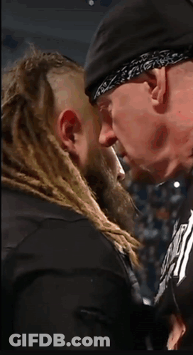 Bearded Man With Bandana Looks At Another GIF