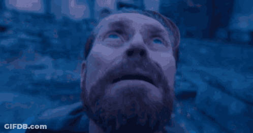 Bearded Man With Blue Eyes Looking Up GIF