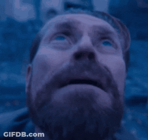 Bearded Man With Blue Eyes Looking Up GIF