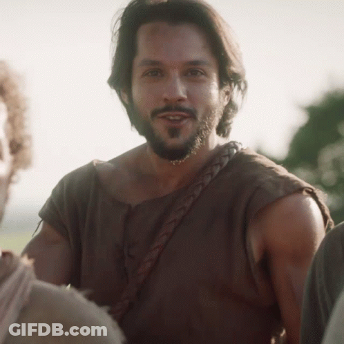 Bearded Man With Braided Strap Around Waist GIF