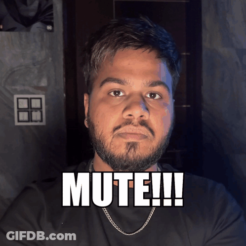 Bearded Man With Chain Saying Mute GIF