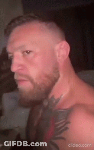 Bearded Man With Chest Tattoo GIF