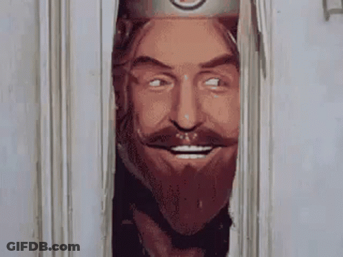 Bearded Man With Crown Looking Out Doorway GIF