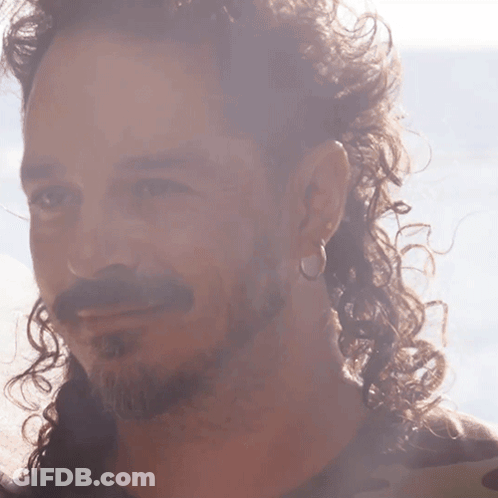 Bearded Man With Curly Hair And Hoop Earring GIF