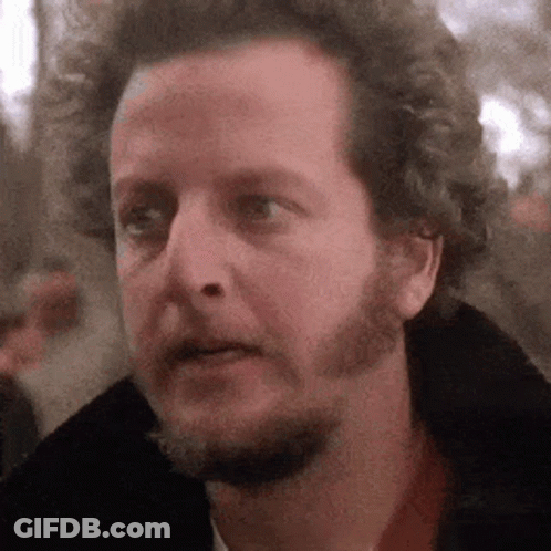 Bearded Man With Curly Hair Making Funny Face GIF