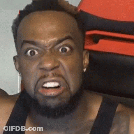 Bearded Man With Earrings Making Funny Face GIF