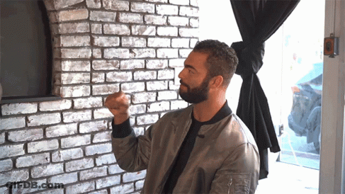 Bearded Man With Fist In The Air GIF