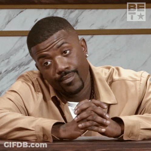 Bearded Man With Folded Hands Before Be TV Logo GIF