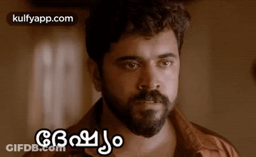 Bearded Man With Foreign Text On Face GIF