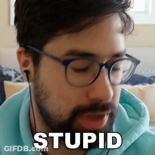 Bearded Man With Glasses And Ear Buds Saying Stupid GIF