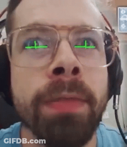 Bearded Man With Glasses And Headphones And Green Eyes GIF