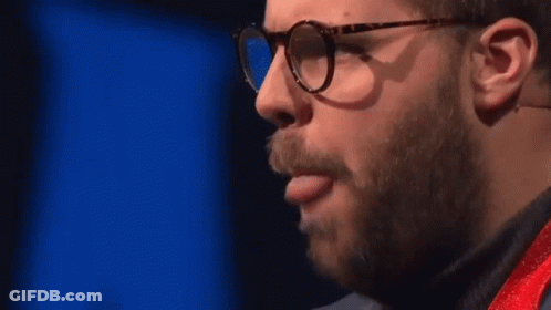 Bearded Man With Glasses Sticking Out Tongue GIF